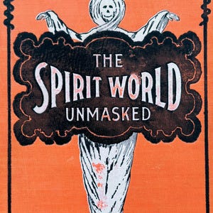 May include: An orange background with a black and white illustration of a ghost-like figure. The text "THE SPIRIT WORLD UNMASKED" is displayed in a black cloud-shaped frame. The image has a vintage, Halloween theme.
