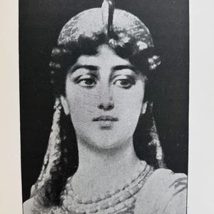 May include: A monochrome portrait of a woman adorned with a detailed headpiece and necklace. The image is a reproduction of an artwork, with the text "FIG. 31 - SICHEL'S ORIGINAL PICTURE OF FIG. 30." displayed at the bottom.