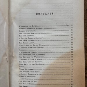 May include: An open book page featuring a detailed table of contents. The title "CONTENTS" is centered at the top, followed by a list of chapter titles and page numbers. The text is printed in black ink on aged, off-white paper.