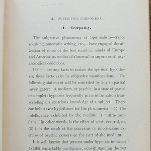 May include: A page from an old book, featuring printed text discussing 'Telepathy' and related topics like spiritualism and hypnosis. The text is set in a classic font, with the page showing signs of age.