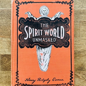 May include: An orange book titled "The Spirit World Unmasked" with a black and white illustration of a ghost on the cover. The book has decorative black borders and the author's name, Henry Ridgely Evans, is printed at the bottom.