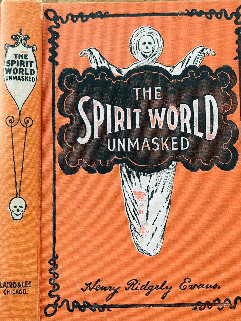 May include: A vintage book cover for "The Spirit World Unmasked" by Henry Ridgely Evans. The cover is orange with black and white illustrations, including a ghostly figure and skull. The book's title is prominently displayed.