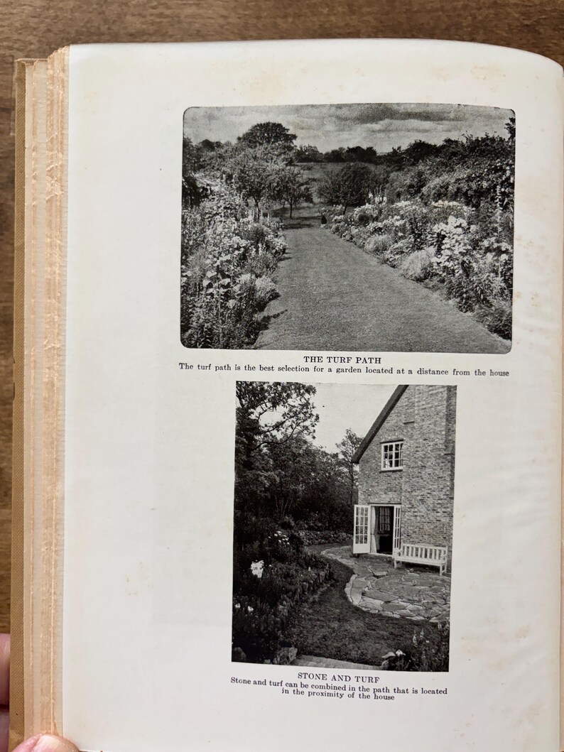 May include: A page from a book featuring two black and white photographs of garden paths. The top image shows a grass path titled THE TURF PATH with text below. The bottom image shows a stone and grass path titled STONE AND TURF with text.