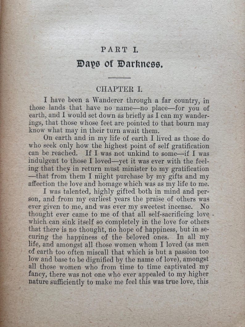 May include: An open book page with text from "Days of Darkness" is displayed. The text is in black font on a beige background. The title "Days of Darkness" is at the top, followed by Chapter I. The text is in a serif font.