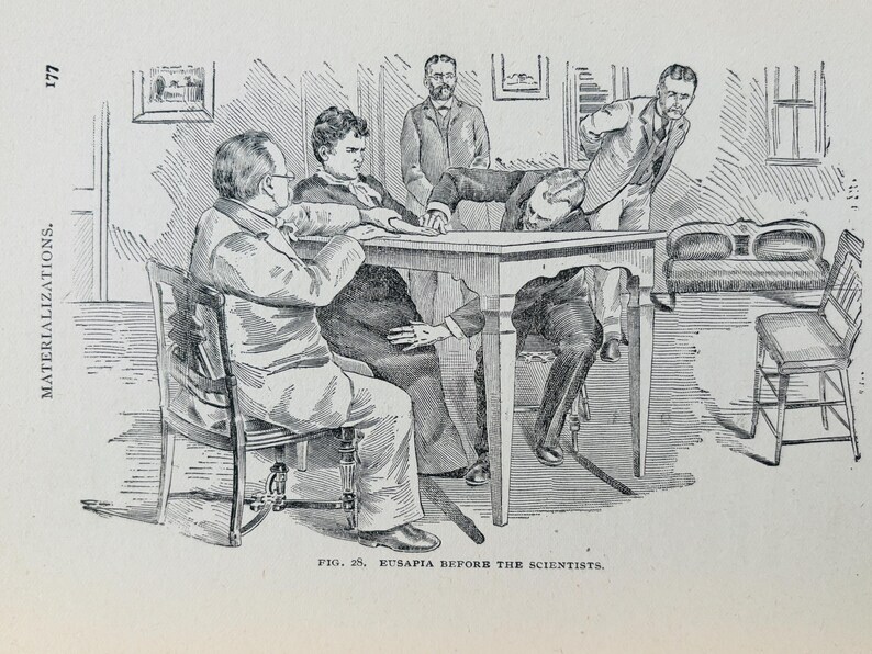May include: A vintage monochrome illustration shows a group of men observing a figure seemingly levitating above a table. The image is titled "FIG. 28. EUSAPIA BEFORE THE SCIENTISTS." The scene is set indoors with furniture.