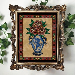May include: A framed illustration of a blue and white vase with a red and green floral arrangement and a black panther inside the vase. The vase is surrounded by a red, yellow, and green border.