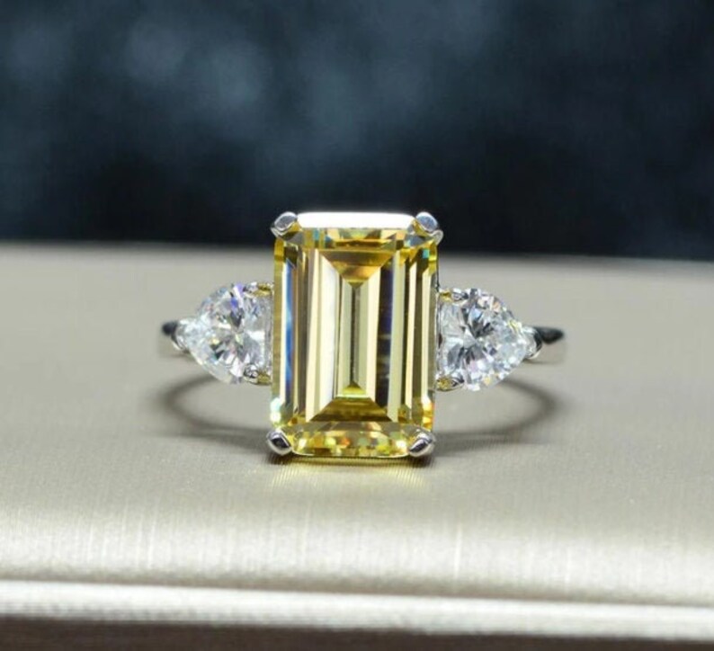 3.80 Ct.w Emerald Cut Diamond Engagement Ring Canary Yellow Wedding Ring Solid 14K White Gold Ring Heart Accents 3-Stone Promise Ring