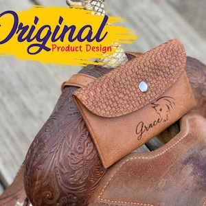May include: A brown leather wallet with a woven flap and a silver snap closure. The wallet is embossed with a horse head and the name "Grace." The image also includes the text "Original Product Design" in a yellow and blue banner.