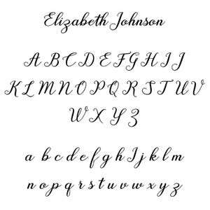 May include: A black script font alphabet display featuring uppercase and lowercase letters, along with the name Elizabeth Johnson written in the same cursive style. The characters are arranged in rows against a plain white background.