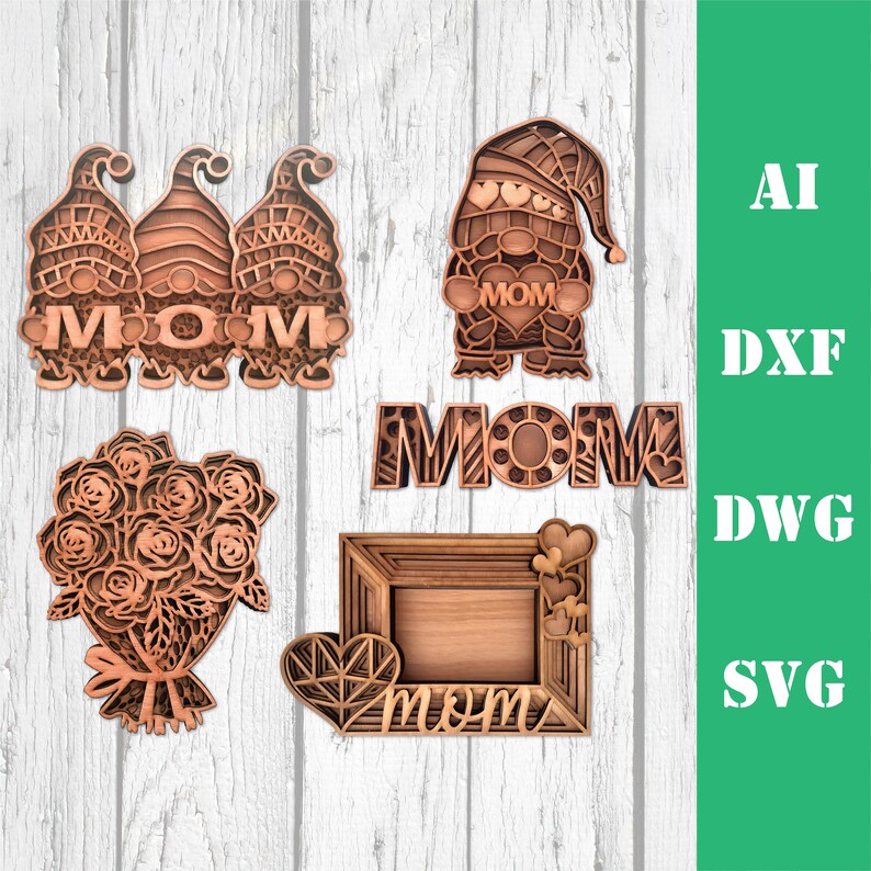 May include: Five laser cut wooden designs for Mother's Day. The designs include a bouquet of roses, a frame with the word "mom" inside, the word "mom" with intricate designs, and two gnomes holding a heart with the word "mom" on it.