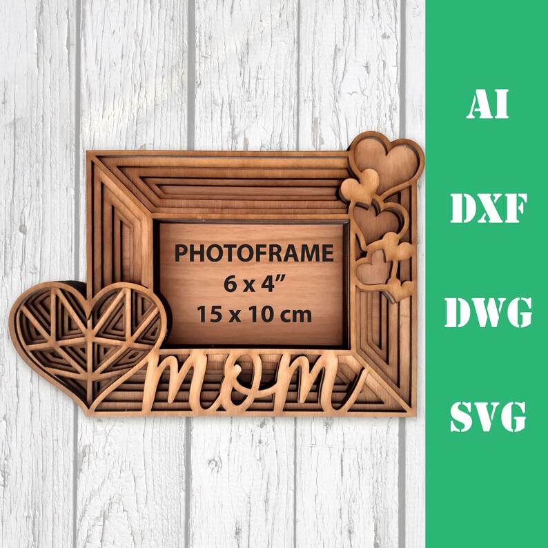 May include: A wooden photo frame with a layered design. The frame is decorated with hearts and the word "mom". The frame is 6 inches by 4 inches, or 15 centimeters by 10 centimeters.