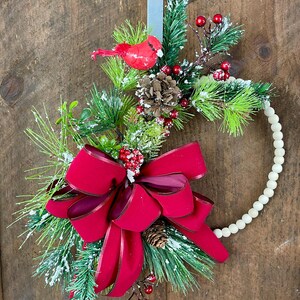 Wood Bead Christmas Wreath with Cardinal and a Red Velvet Bow