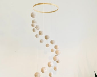 Spiral mobile with pompoms neutral unisex color