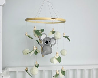 Baby mobile with koala, leaves and wooden beads
