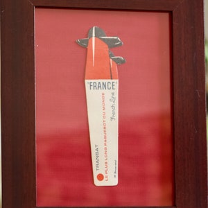 Marcador “Francia, el transatlántico más largo del mundo” de R. Bouvard. Edición original Compagnie Générale Transatlantique 1962 - Bajo cristal