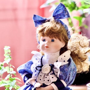 Porcelain doll with beautiful blue eyes image 1