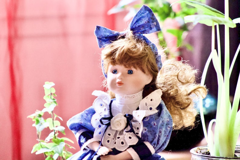 Porcelain doll with beautiful blue eyes image 1