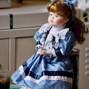 Porcelain doll with beautiful blue eyes image 3