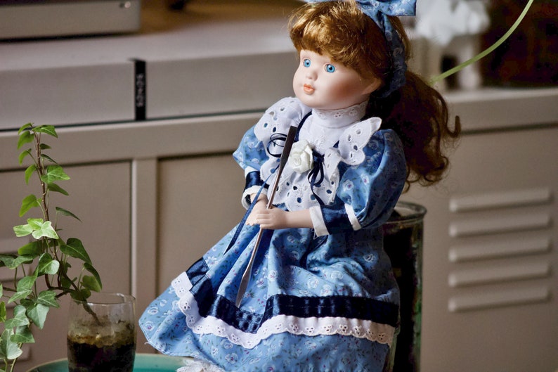 Porcelain doll with beautiful blue eyes image 3