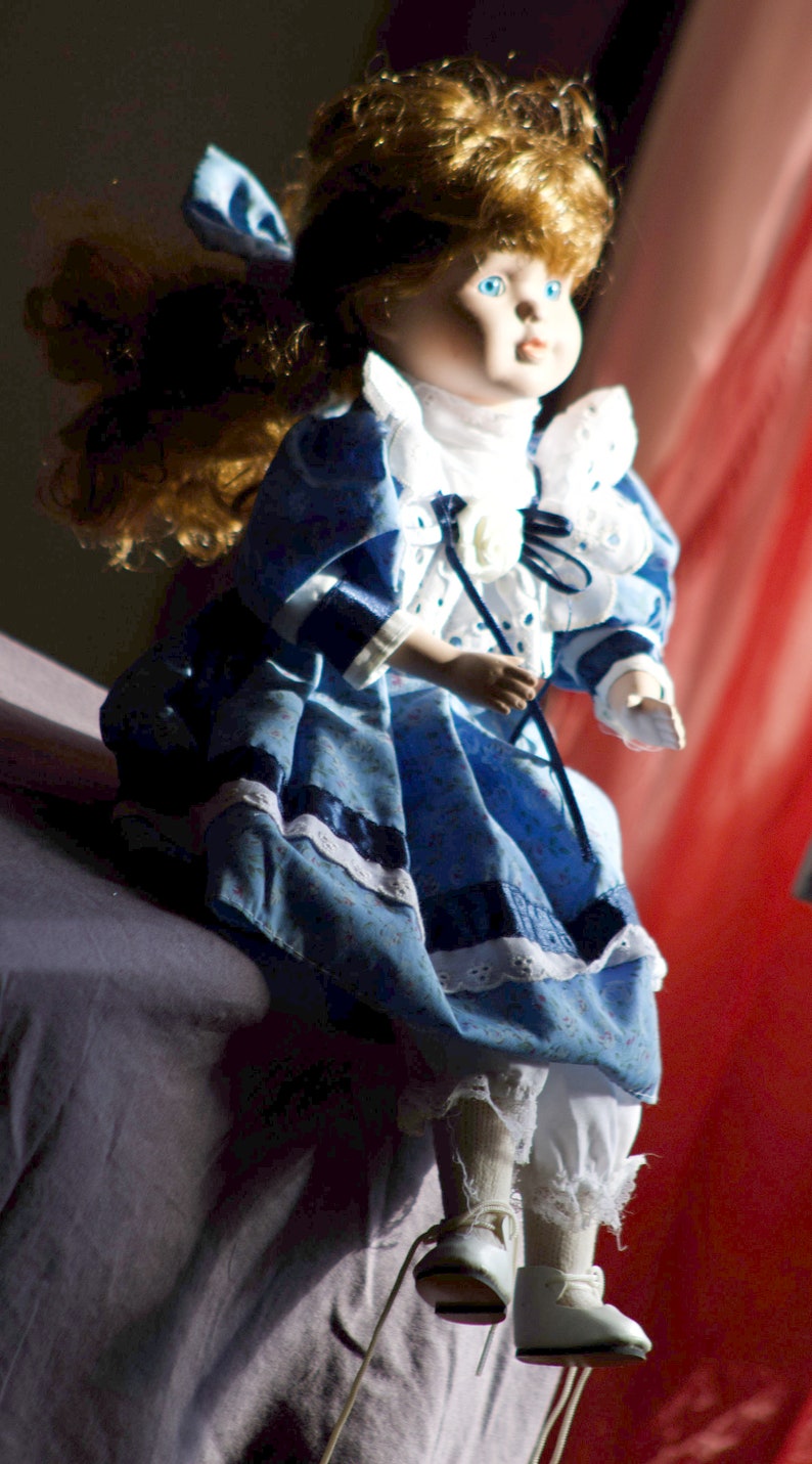 Porcelain doll with beautiful blue eyes image 8