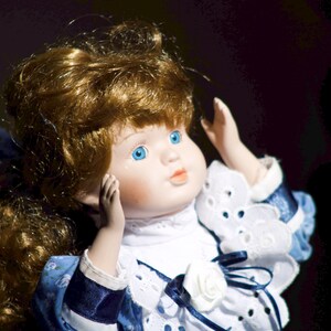 Porcelain doll with beautiful blue eyes image 10