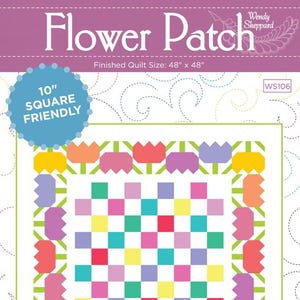 以下が含まれることがあります： 「Flower Patch」というタイトルのカラフルなキルトパターンで、完成サイズは122cm x 122cmです。さまざまな色の正方形の中央グリッドと、様式化された花の形のボーダーが特徴です。パターンは「10」スクエアフレンドリー」です。