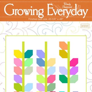 May include: A quilt pattern titled "Growing Everyday" with a finished size of 43-1/4" x 48". The design features three vertical rows of colorful, stylized leaves in shades of yellow, pink, green, blue, and orange. The quilt pattern is on a white background.