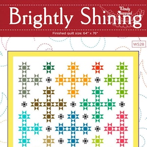 May include: A quilt pattern called "Brightly Shining" by Wendy Sheppard. The pattern features a colorful quilt block design with a variety of geometric shapes and colors. The finished quilt size is 64" x 76".