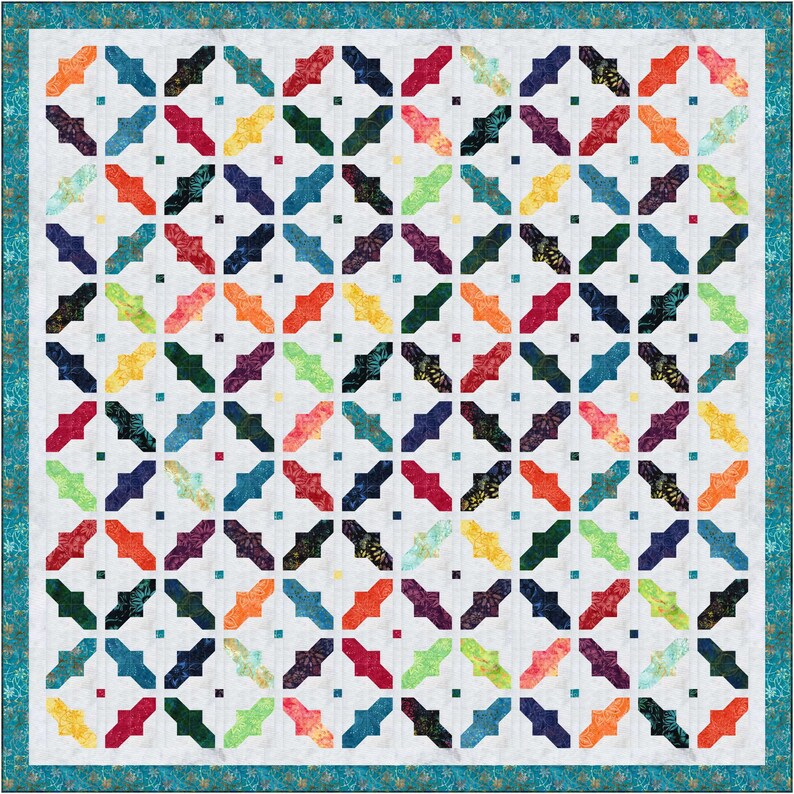 May include: A colorful quilt with a geometric pattern of overlapping squares and rectangles. The quilt is made with a variety of fabrics in shades of blue, green, red, orange, yellow, and white.
