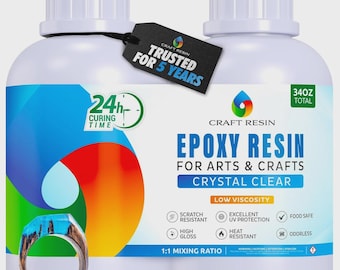 May include: Two white plastic bottles of Craft Resin epoxy resin for arts and crafts, totaling 340oz. The labels feature a colorful circular graphic, a 24-hour curing time icon, and a black tag stating Trusted for 5 Years. A wood and blue resin ring is shown.
