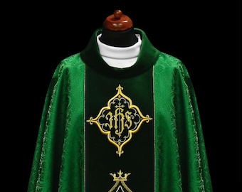 May include: Green liturgical vestment with gold embroidery of the monogram "IHS" in a decorative frame.