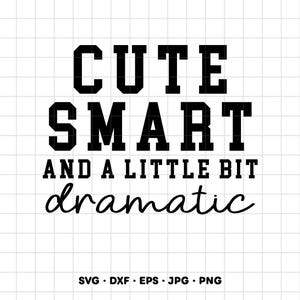 May include: A black graphic design featuring the text CUTE SMART AND A LITTLE BIT dramatic in a combination of bold block lettering and a cursive script font, presented on a white grid background with file format labels SVG DXF EPS JPG PNG.