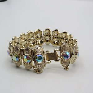 CORO PEGASUS amazing gold tone panel bracelet with ab rhinestones, safety clasp. signed clasp. immaculate condition, 7.5-inch length