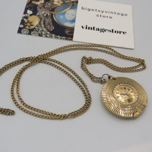 gorgeous vintage gold tone chain with a SEKONKA watch pendant, lovely piece in lovely condition, the watch itself is untested but still....