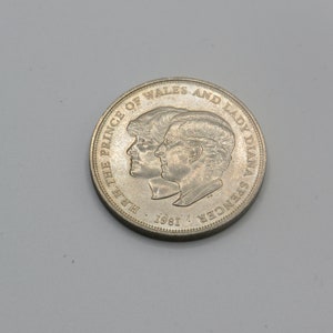 H.R.H the price of wales and lady diana spencer coin , collectable royal memorabilia
