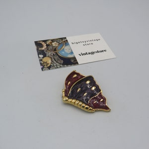 beautiful vintage gold tone butterfly brooch, wonderful design, immaculate condition, two tone purple enamel wings with gold tone detail....