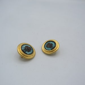 spectacular vintage roman coin clip on earrings, stunning piece with beautiful detailing, patina to the coins, great condition..........