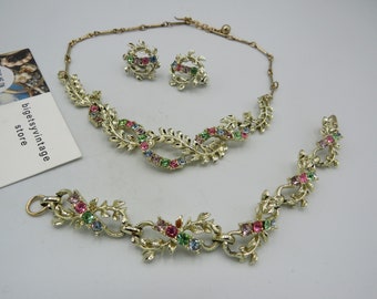spectacular vintage silver tone JEWELCRAFT set with necklace, bracelet and clip on earrings, all in immaculate condition..........