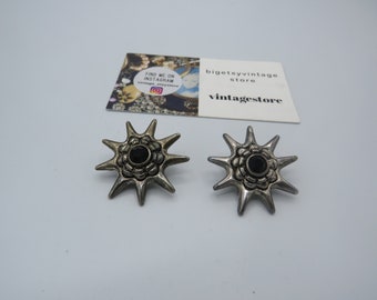 amazing vintage silver tone clip on statement earrings, 9 point star design with black rhinestone, lovely condition, unusual, 3.5cm diameter