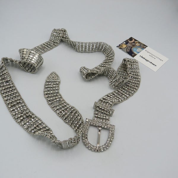 gorgeous vintage silver tone belt filled with sparkling clear rhinestones, no stones missing, excellent condition....