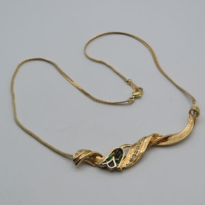 stunning vintage gold tone necklace, attached pendant, clear rhinestones with enamel detailing, great condition, statement piece, 18-inch