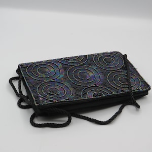 stunning vintage clutch purse / hand bad , cord handle, superb bead work and sequin detailing , beads missing from one corner as seen ,