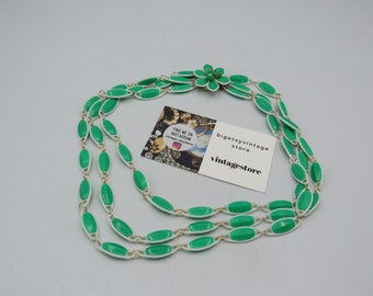 amazing vintage multi strand kitch necklace with vibrant green and white plastic beads, made in Hong Kong , beautiful flower box clasp......
