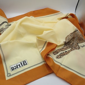 amazing vintage cheetah headscarf, marked Africa, great condition, 75x75cm length, lovely design, beautiful images, vibrant, statement