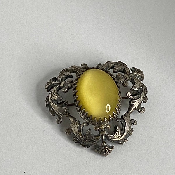 Amazing quality Victorian brooch , large glass ? Central cabochon in a mellow yellow , silver metal and stone un tested , collectors item