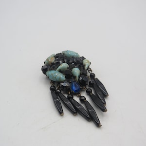 stunning unusual old vintage brooch with faux turquoise , blue and black rhinestones. hanging black glass beads, lovely vintage condition