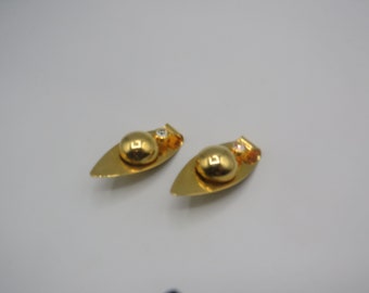 beautiful vintage gold tone clip on earrings , large statement piece , modernist style , great condition , clear rhinestone , 5cm drop
