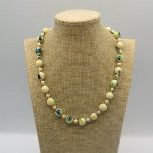 lovely vintage lite weight plastic beaded necklace with splashed of blue and green , barrel clasp , 19 inch length , vintage bead necklace