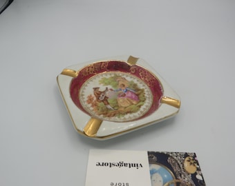 C P LIMOGES stunning vintage porcelain ashtray with gold plated detailing and a image of a courting couple, lovely piece ......