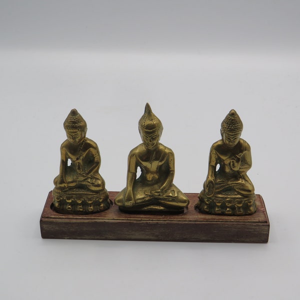 beautiful vintage Dhyani buddha solid brass figures on wooden stand , lovely collectable set , vintage , vintage buddah statues